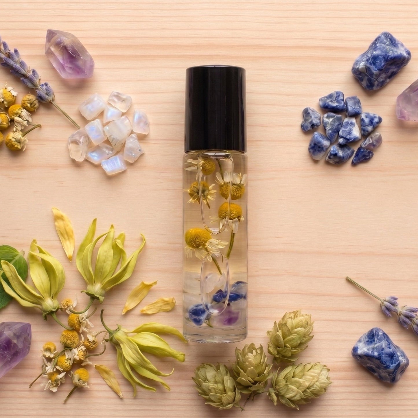 sleep time essential roller with hops, chamomile, ylang ylang, moonstone, amethyst, sodiolite. 